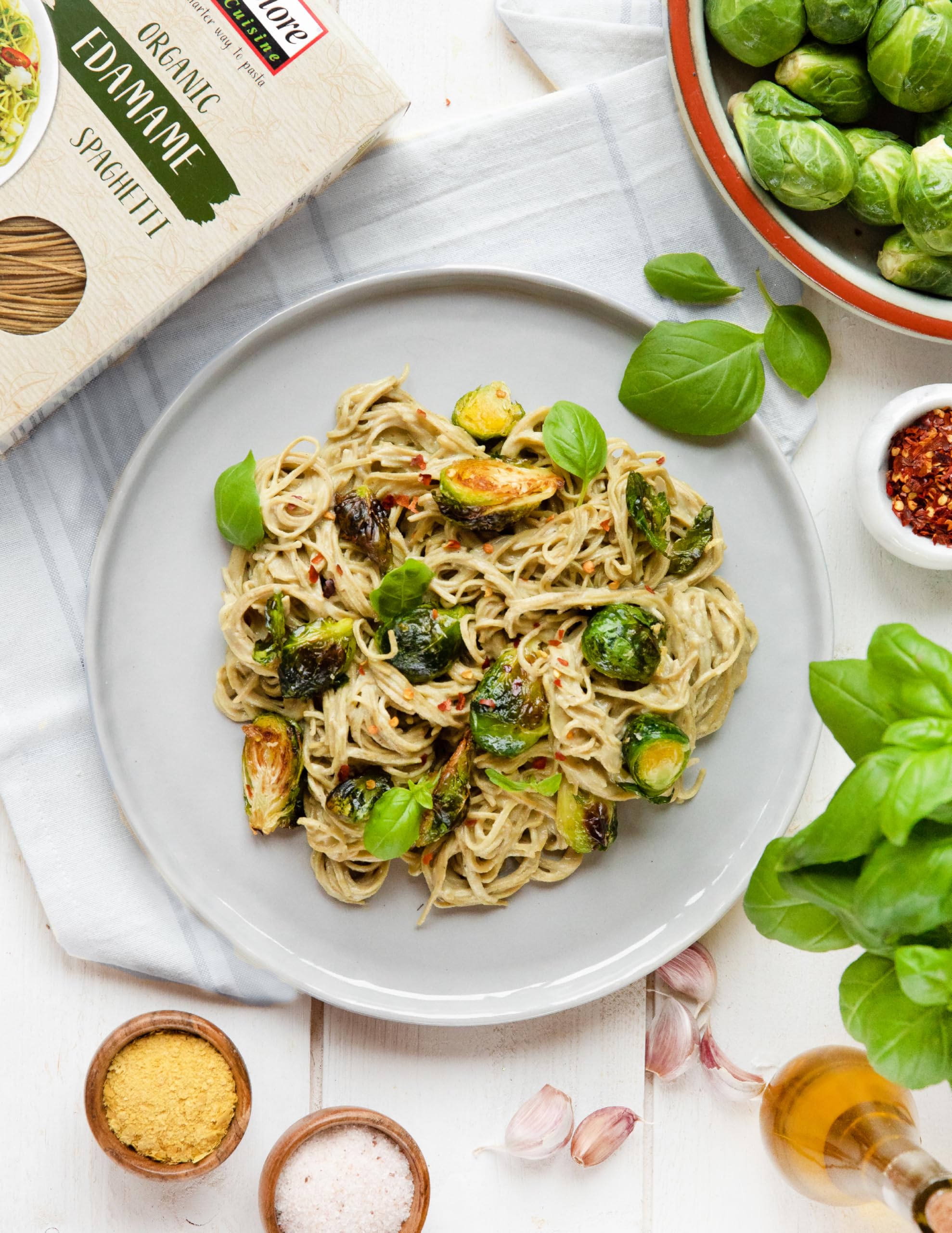 EXPLORE CUISINE Edamame Spaghetti on kitchen scale showing portion control.