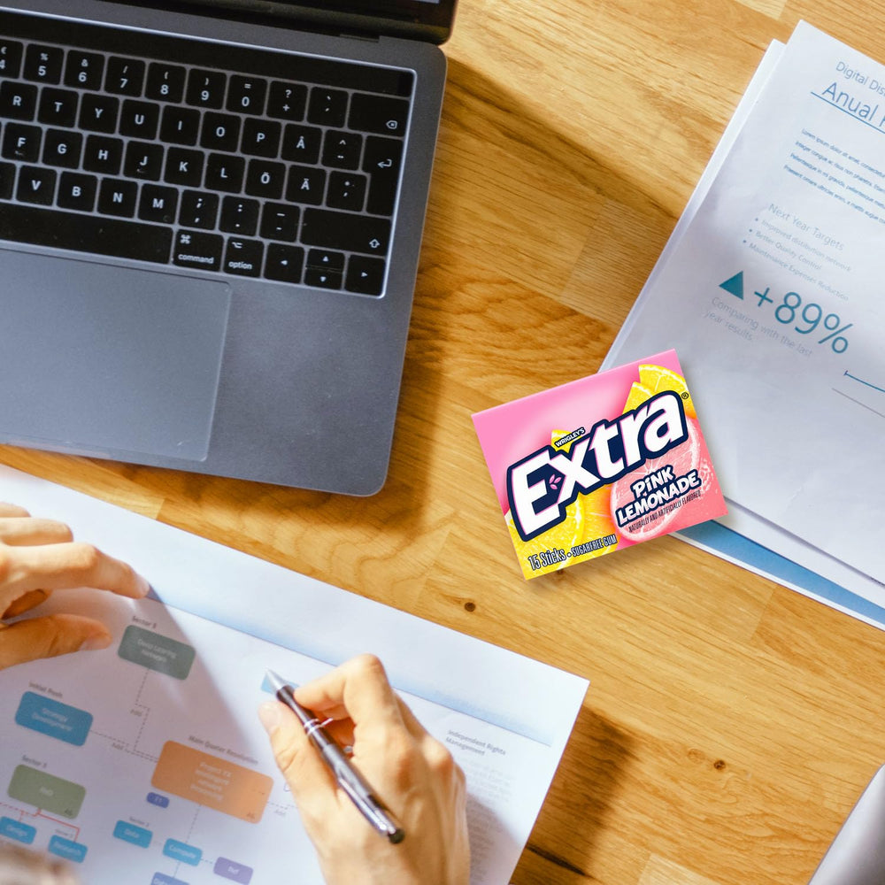 Extra Pink Lemonade Gum breath-freshening moment during study or work breaks.