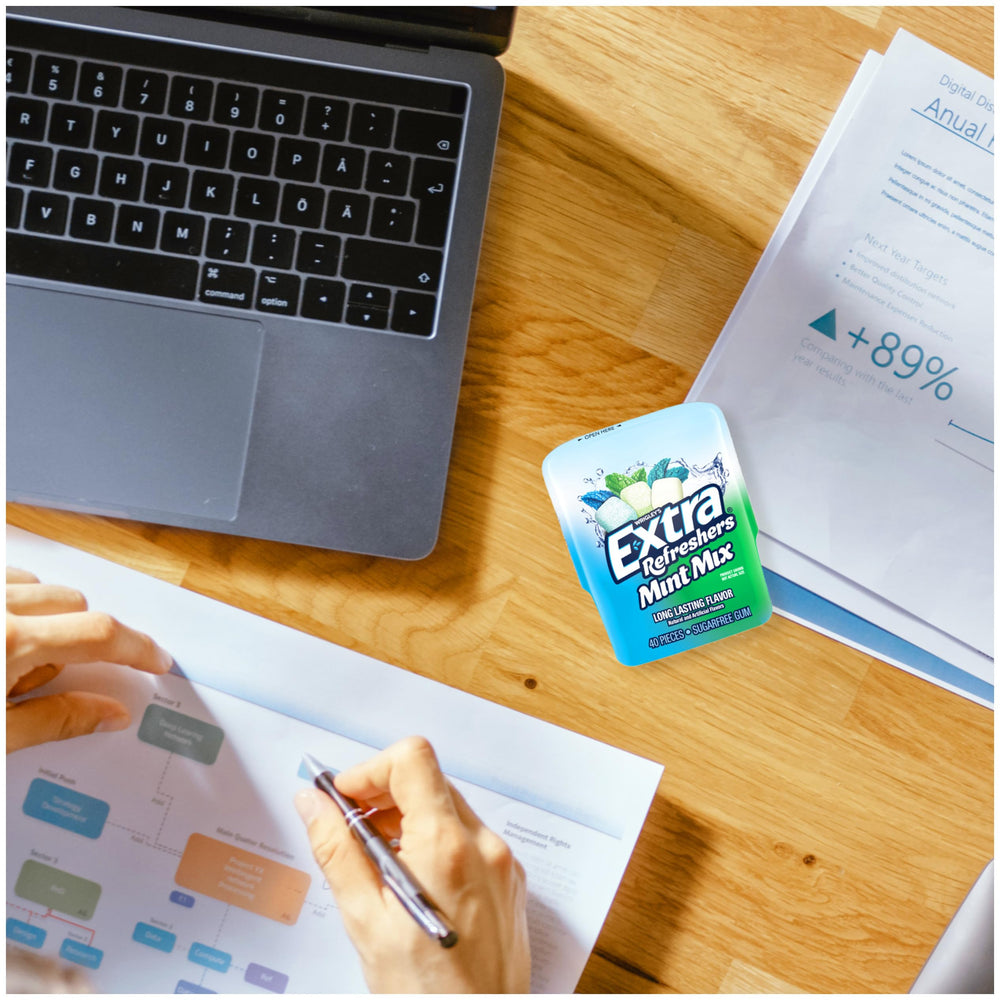 Extra Refreshers Mint Mix Gum sharing among friends, enhances social moments with fresh breath.