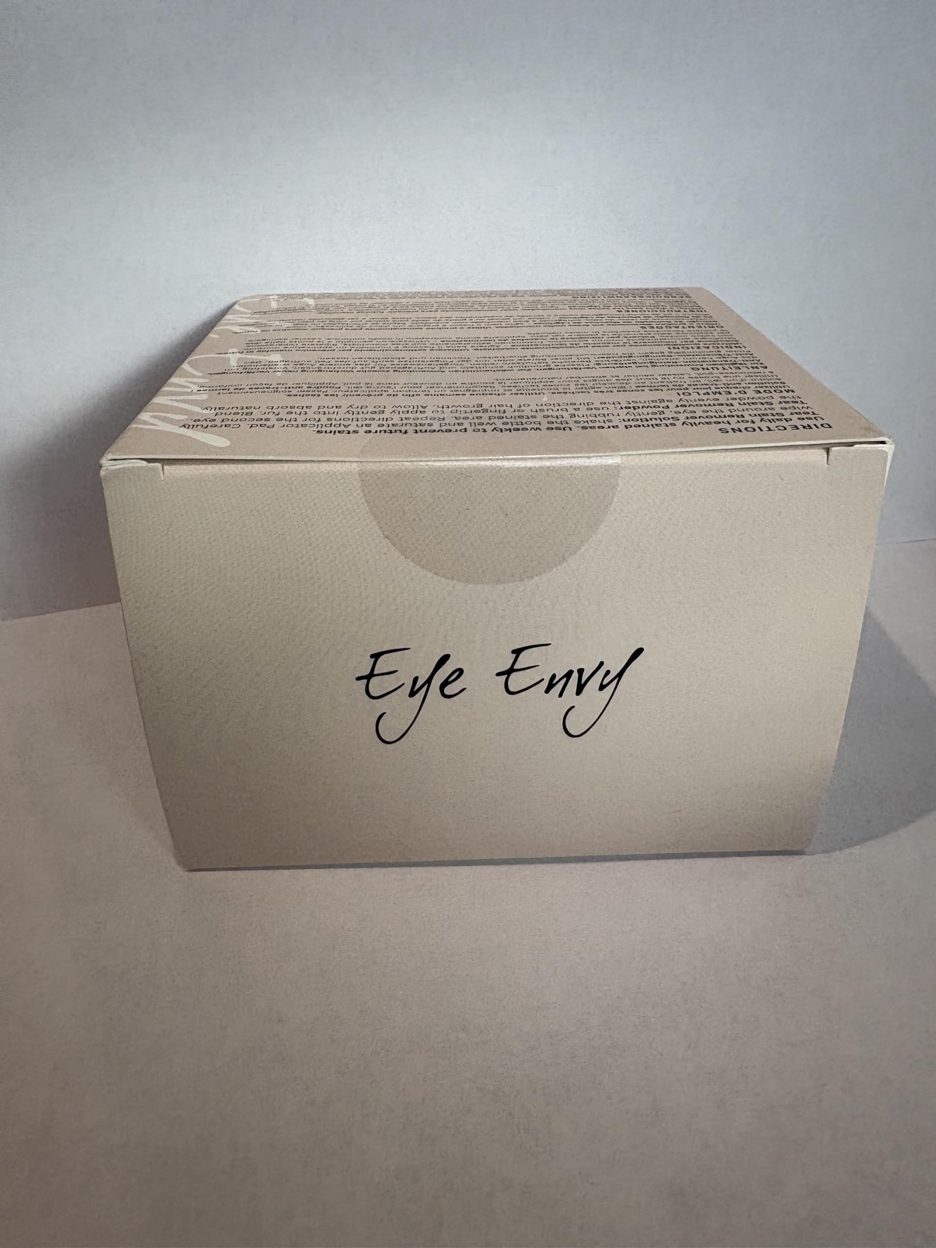 Eye Envy Tear Stain Remover Powder container highlights moisture-absorbing formula for drier eye area.