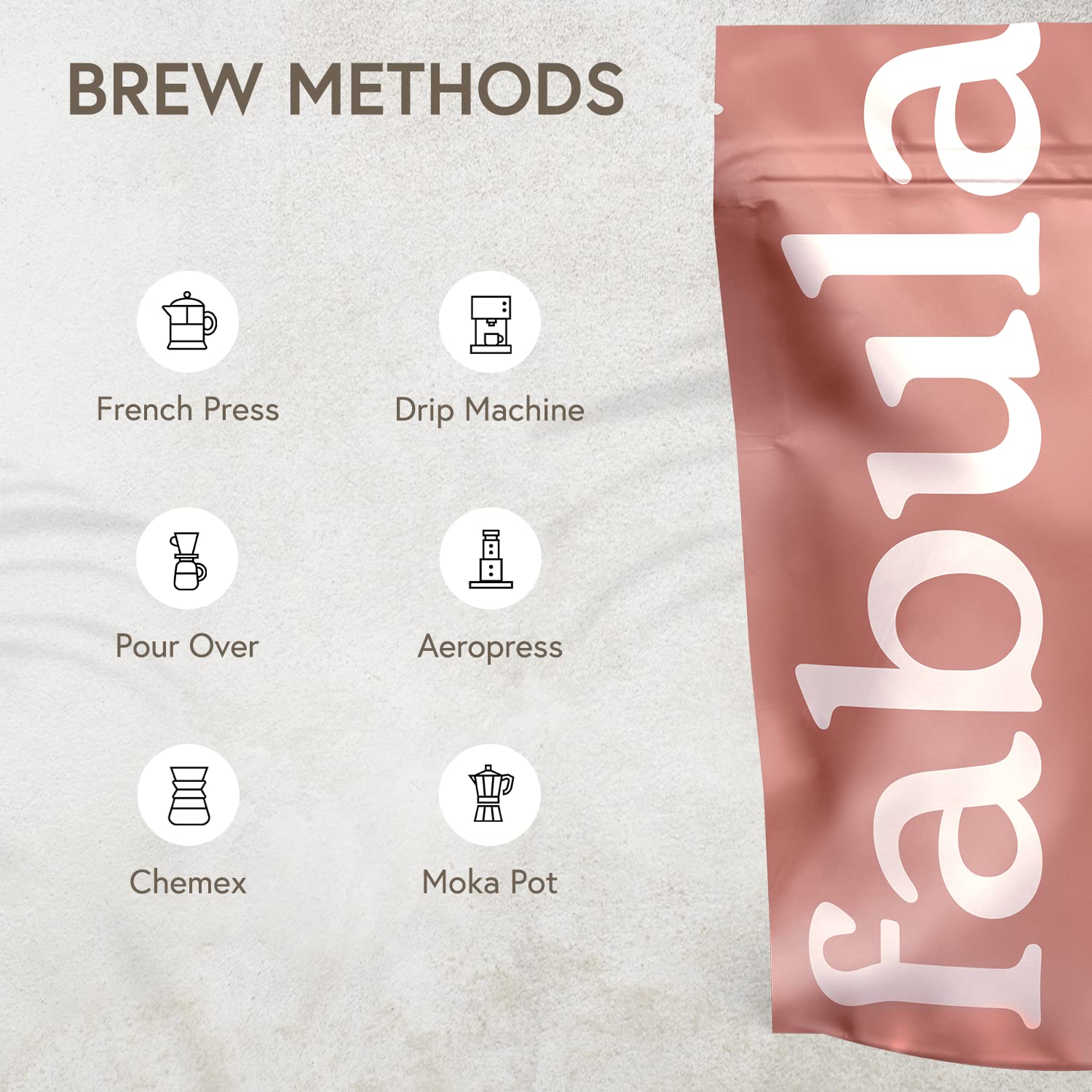 Fabula Light Roast roasted beans in hand evoke premium freshness and aroma.