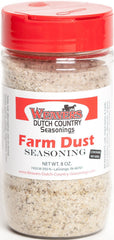 Farm Dust Seasoning bottle front showing all-purpose flavor enhancer in a modern kitchen.