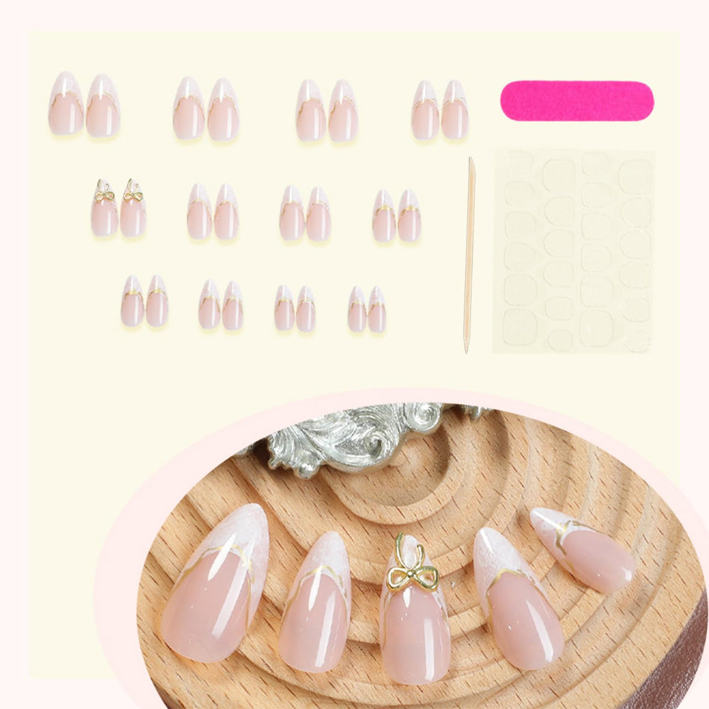Nail file helps shape and perfect the almond tips.