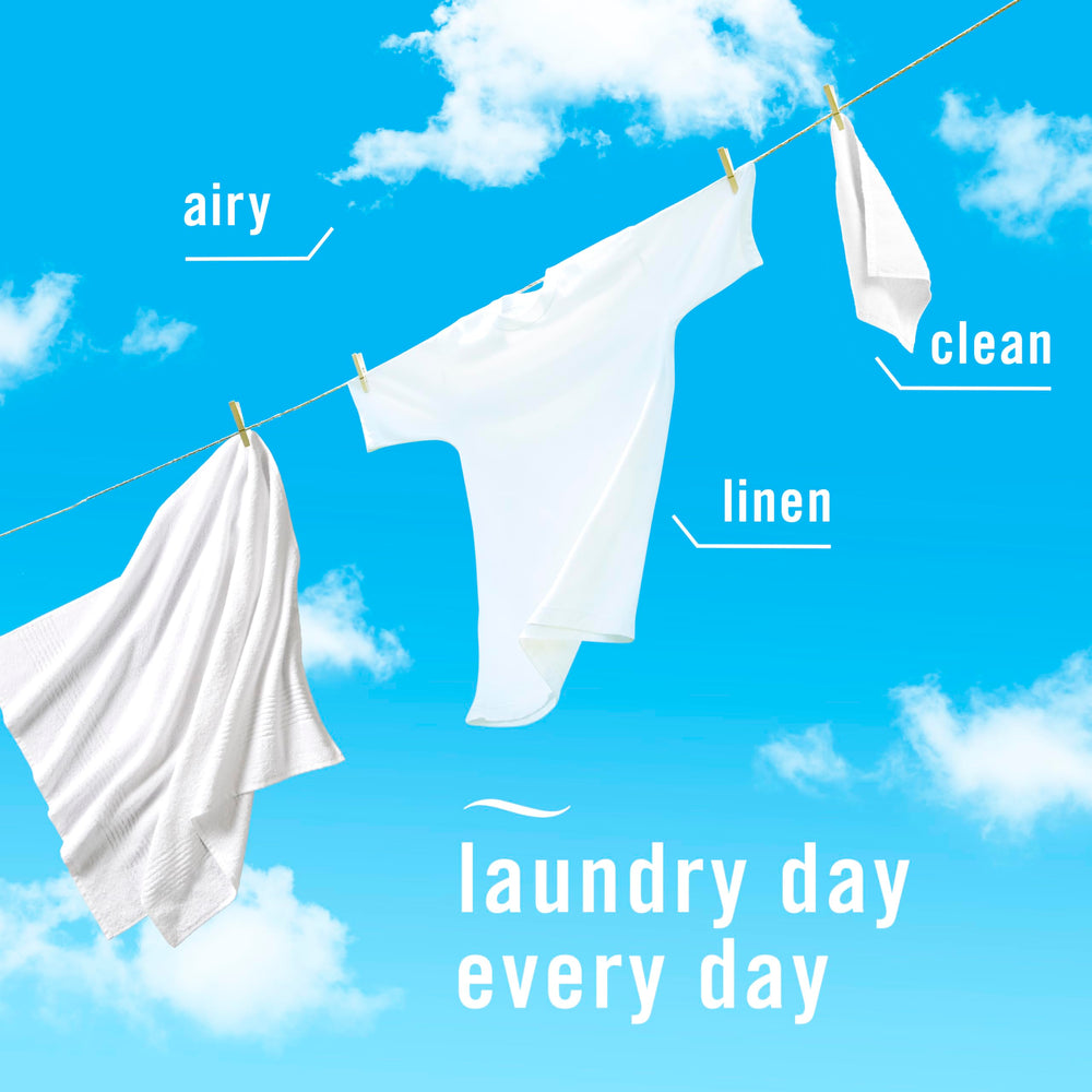 Febreze Air Mist Linen & Sky can misting bathroom air with a clean scent