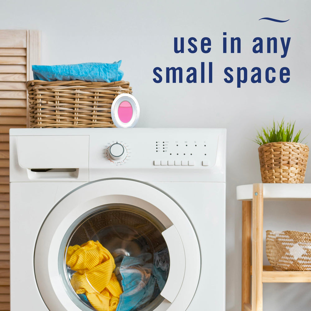 Febreze Downy April Fresh diffuser in use for continuous room freshness.