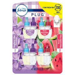 Febreze Fade Defy plug-outlet view shows lasting freshness in a busy kitchen.