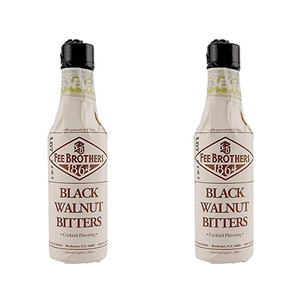 Fee Brothers Black Walnut bitters bottle close-up, ideal for enhancing bourbon and rye cocktails.