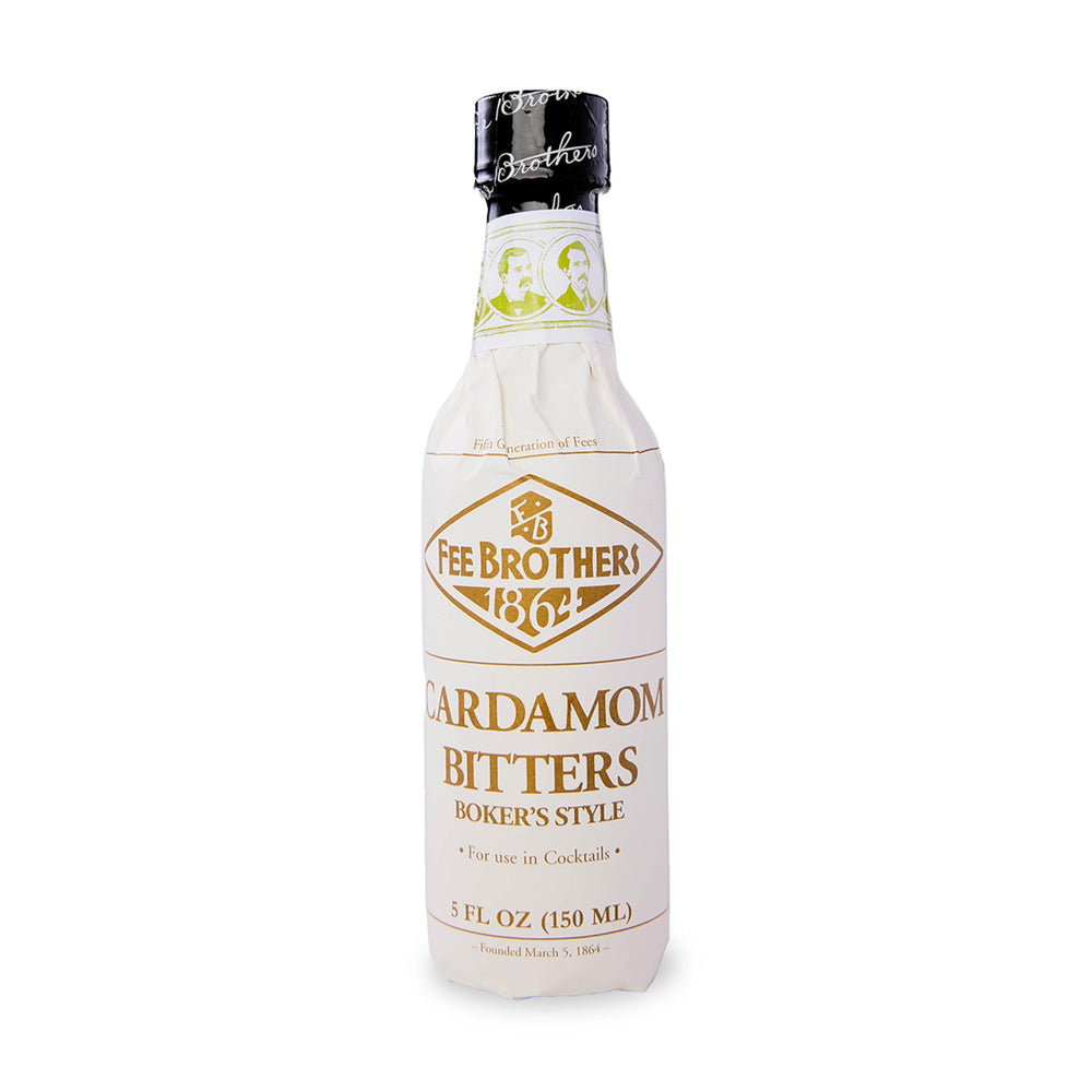 Fee Brothers Cardamom Bitters bottle pour enhances cocktail depth.