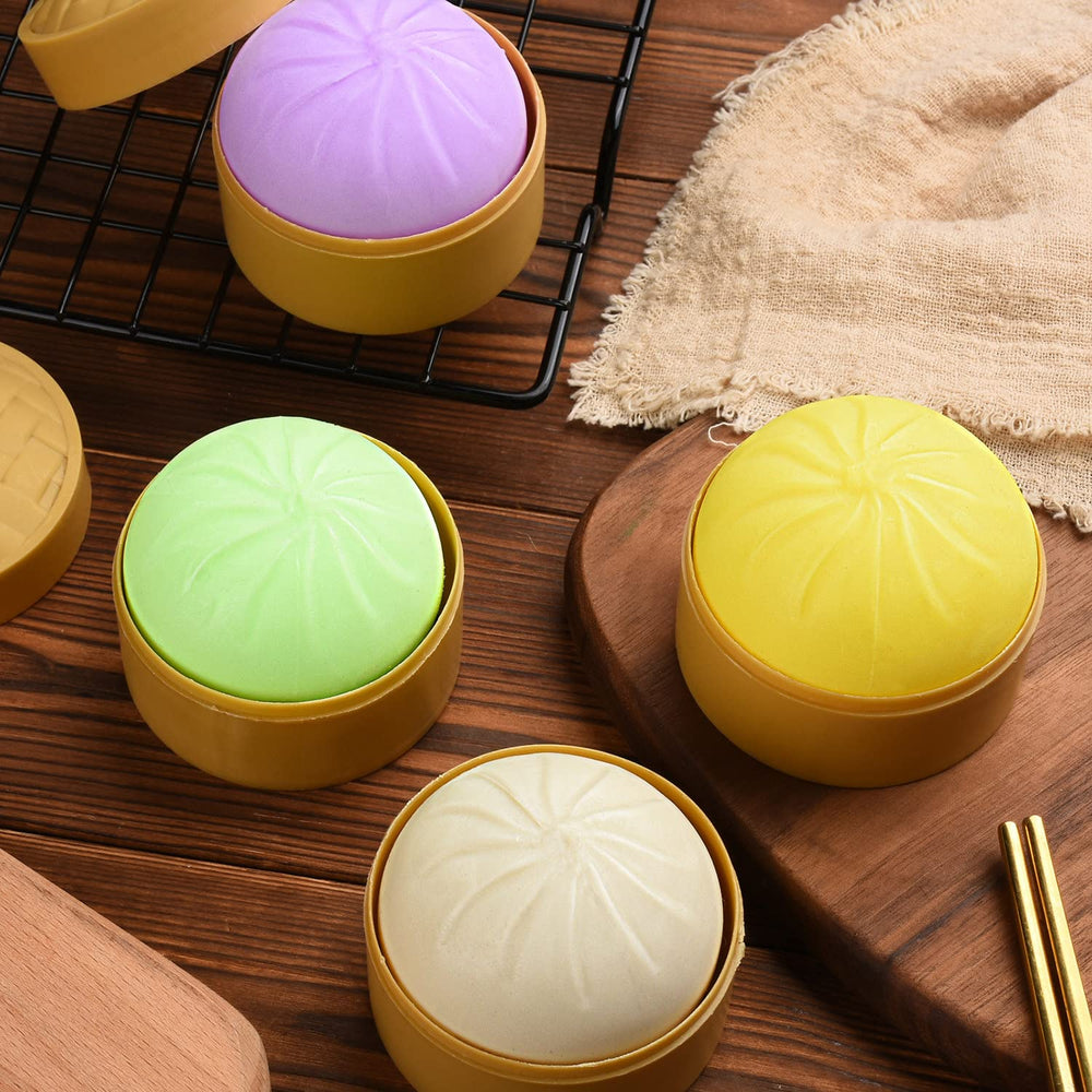 FFNIU hand-squeeze demo showing compact 2-inch dumpling stress ball