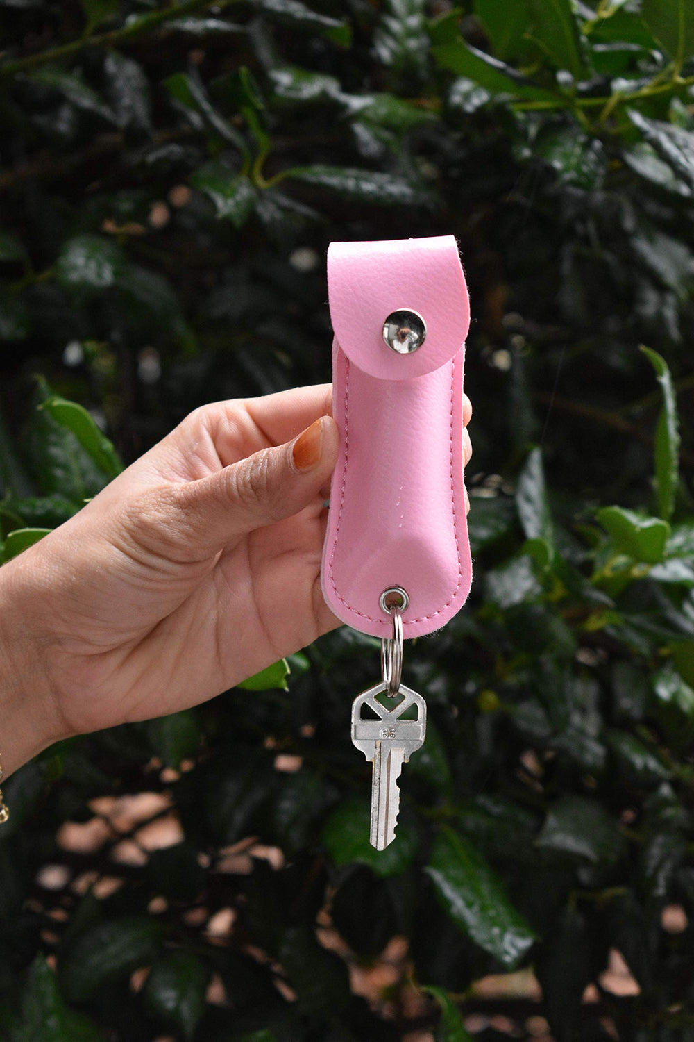 FIGHTSENSE leather case on a keychain for easy carry.