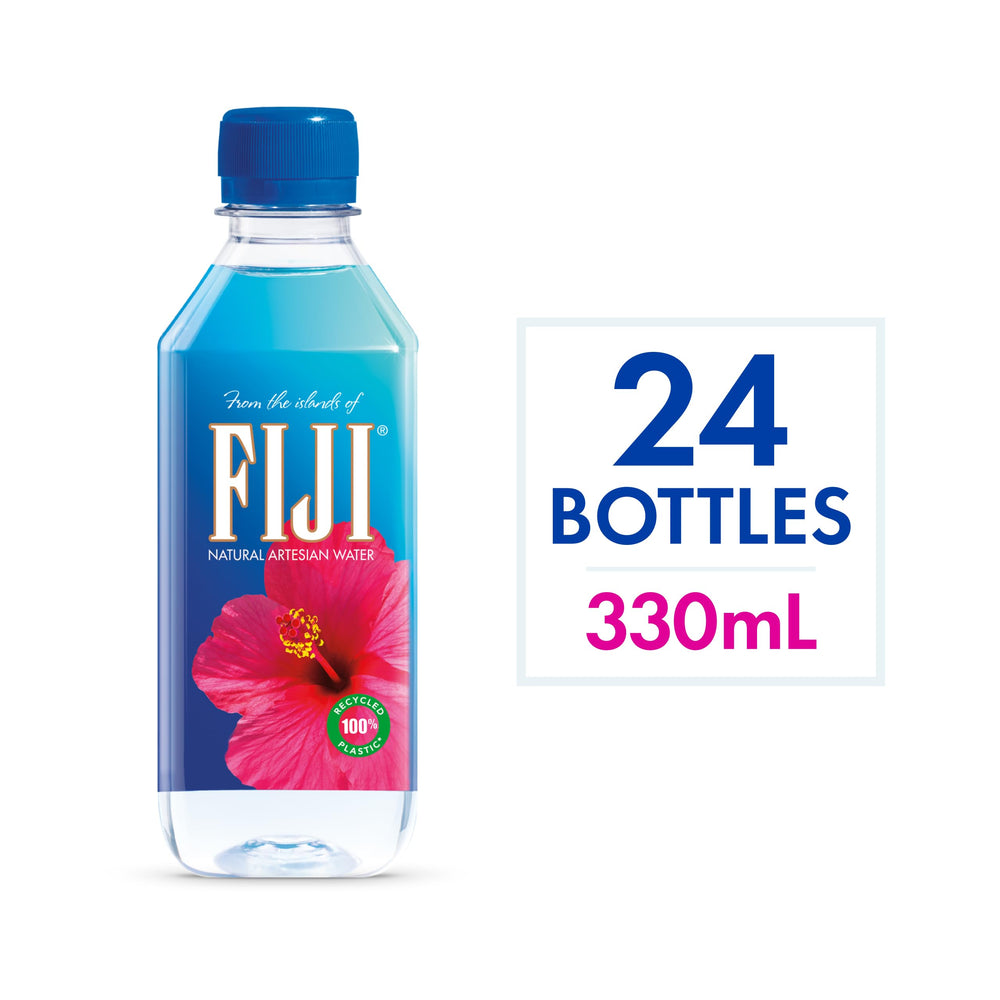 FIJI Water 330mL bottle at dinner party, premium hydration.