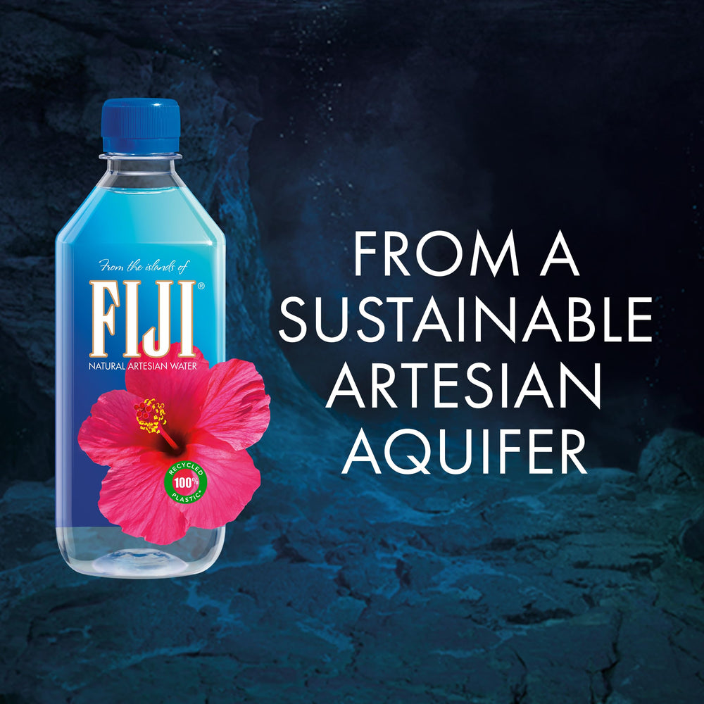 FIJI water bottle in hotel minibar display for everyday luxury and refreshment.