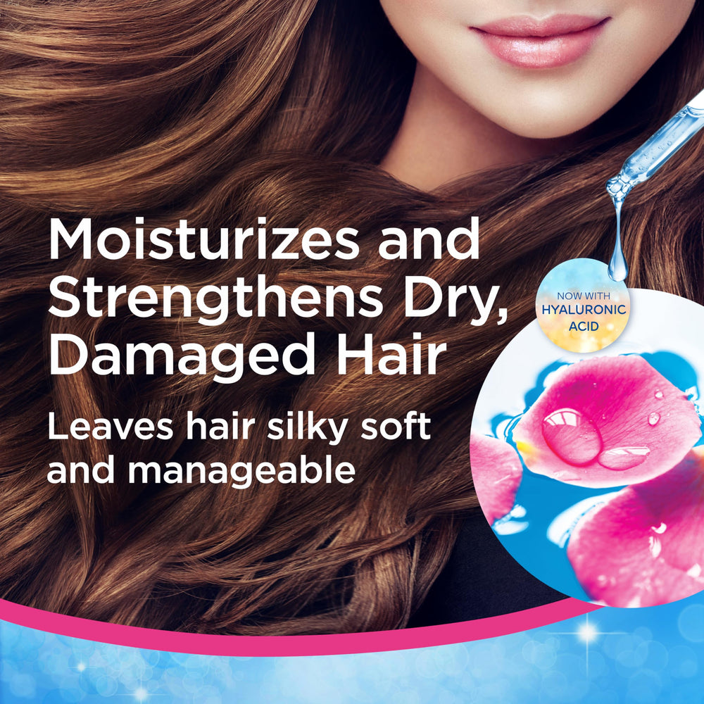 Finesse Restore Strengthen conditioner pour shot enabling seamless application and hydration.
