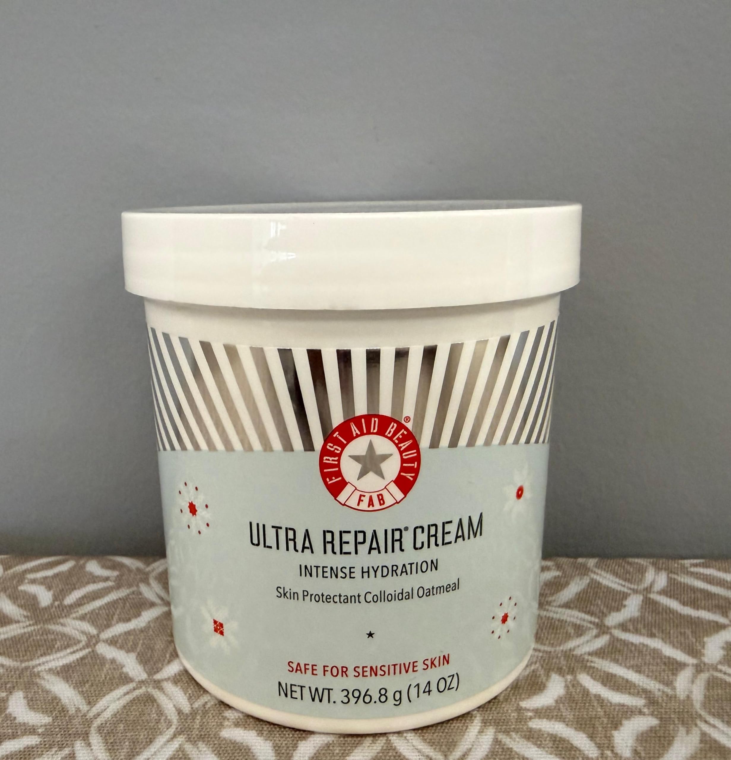 First Aid Beauty Ultra Repair Cream back-label closeup with ingredients and notes.