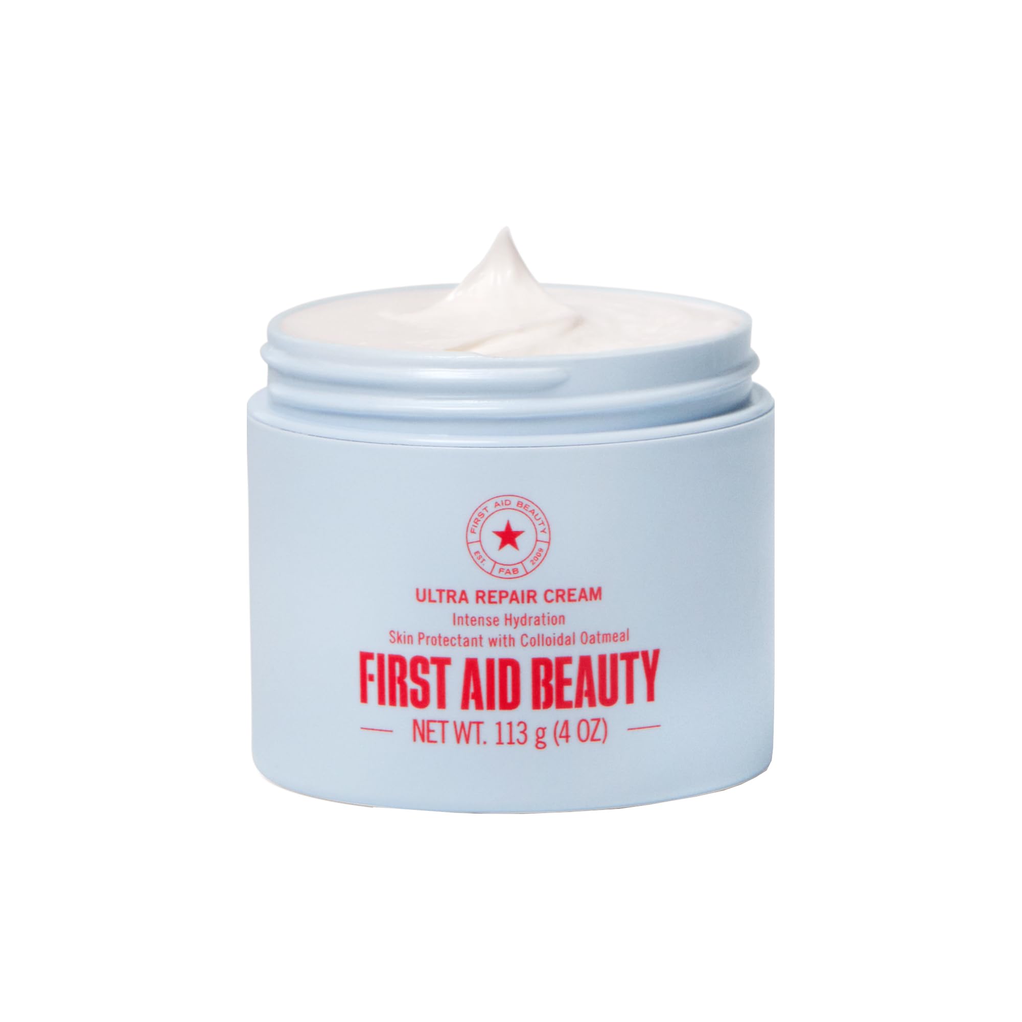 First Aid Beauty Ultra Repair Cream jar close-up shows whipped texture for daily hydration.