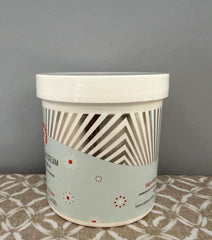 First Aid Beauty Ultra Repair Cream packaging on shelf signals barrier support.