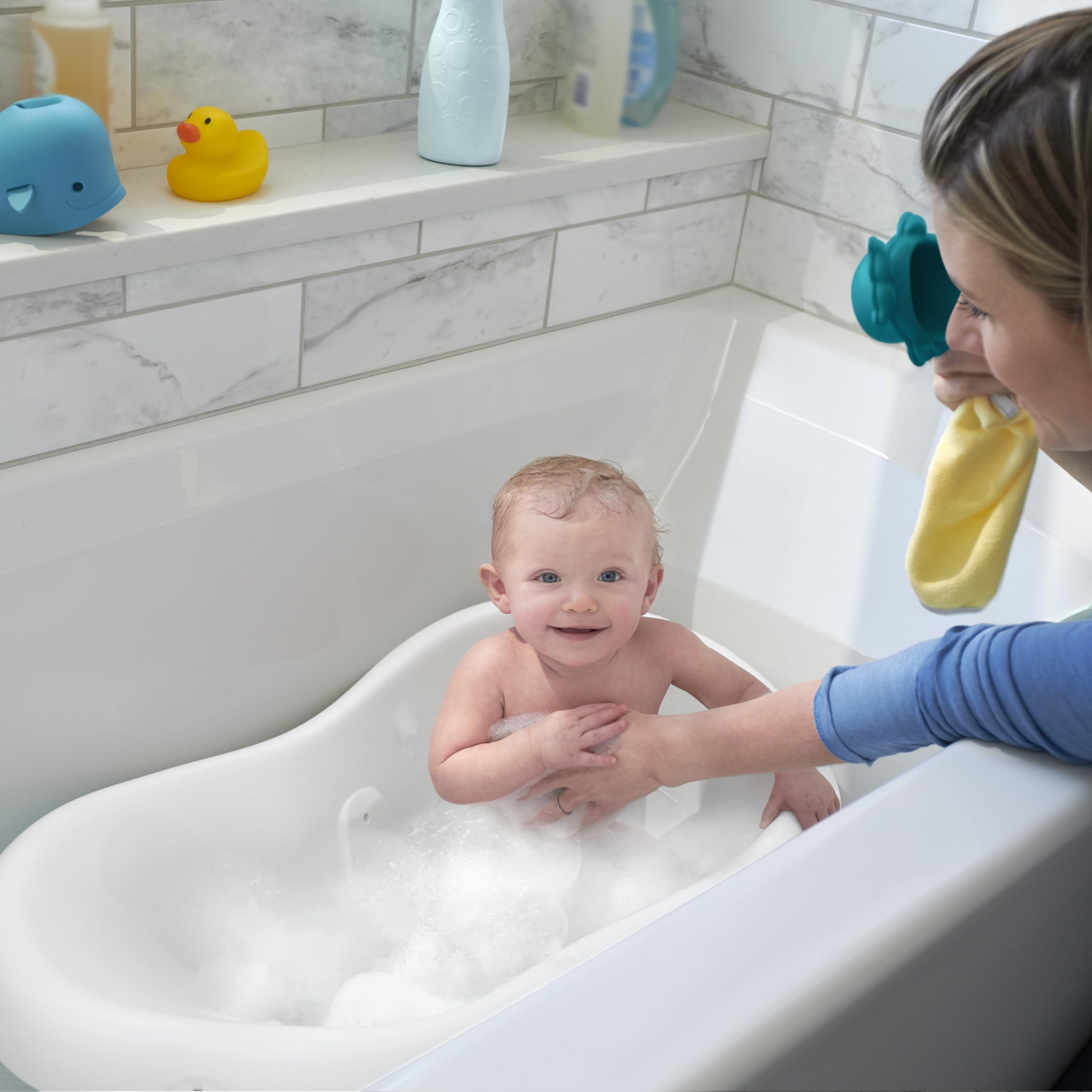 Fisher-Price Sit-Me-Up insert demonstrates extra stability for unsteady sitters