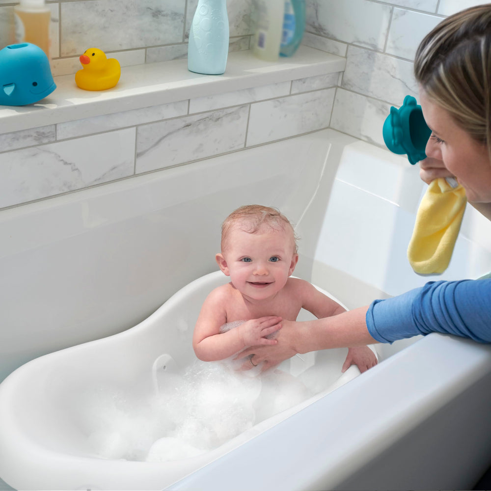 Fisher-Price Sit-Me-Up insert demonstrates extra stability for unsteady sitters