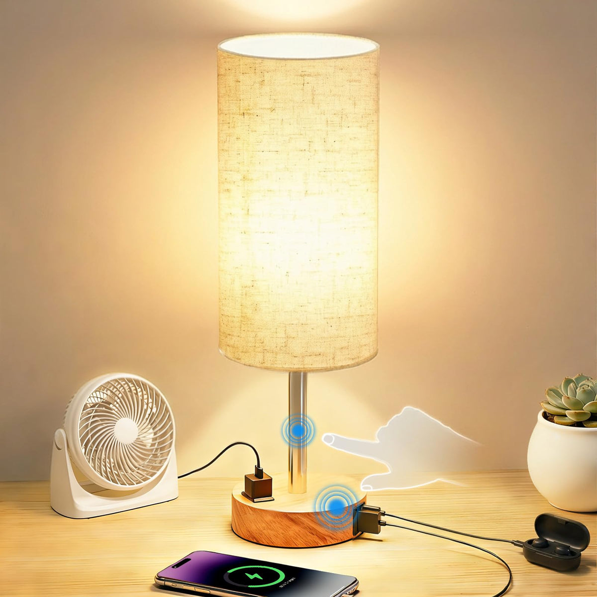 Fitfull table lamp with AC outlet and USB-C port powers bedside devices.