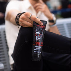 Fix Your Lid styling gel applied to wet hair for versatile styling.
