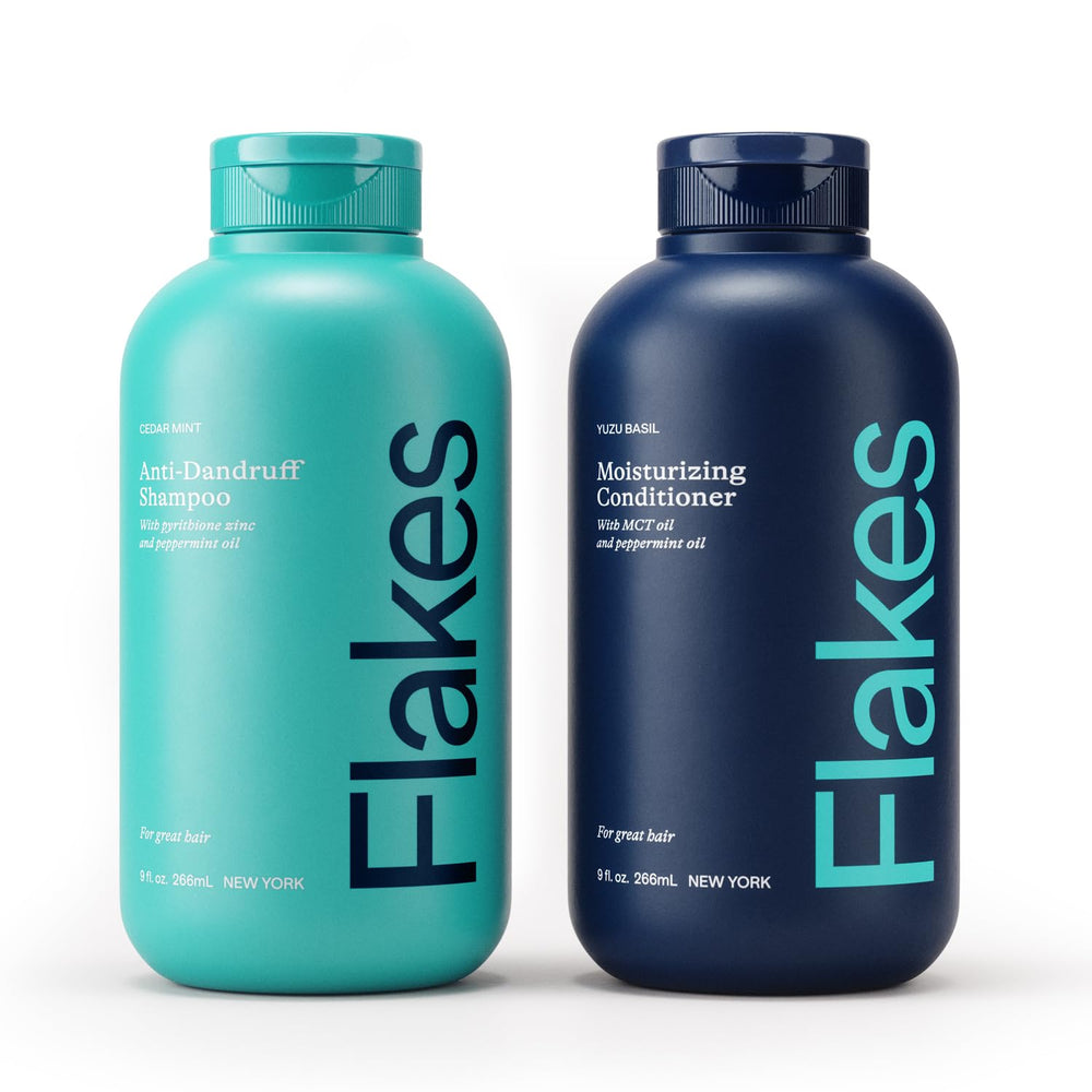 Flakes shampoo bottle pour shows 2% zinc pyrithione for dandruff relief.