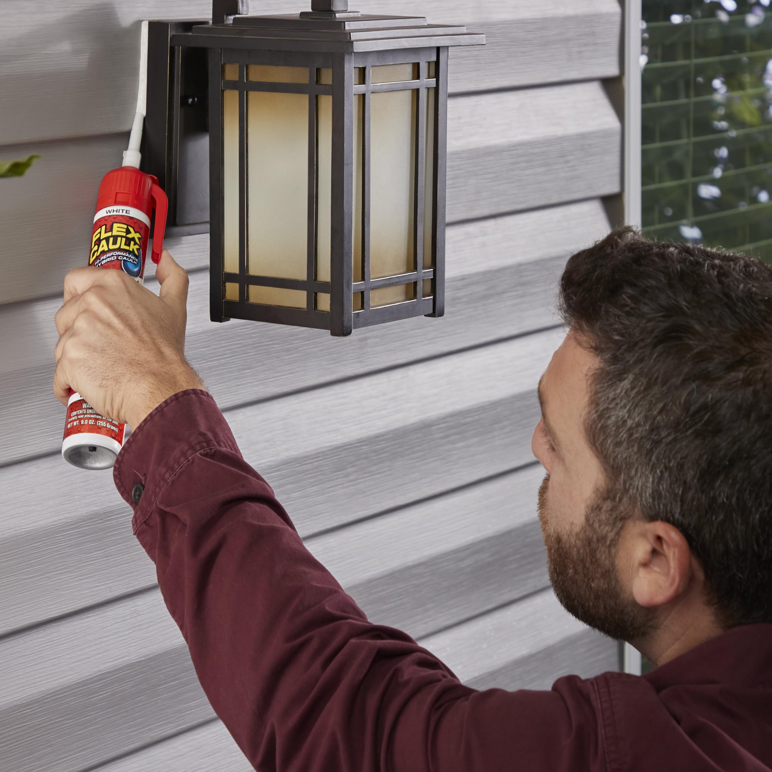 Flex Seal Flex Caulk adhesion demo shows strong grip on wet and dry surfaces.