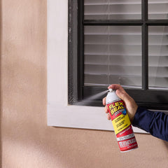 Flex Seal sealing a gutter to stop leaks.
