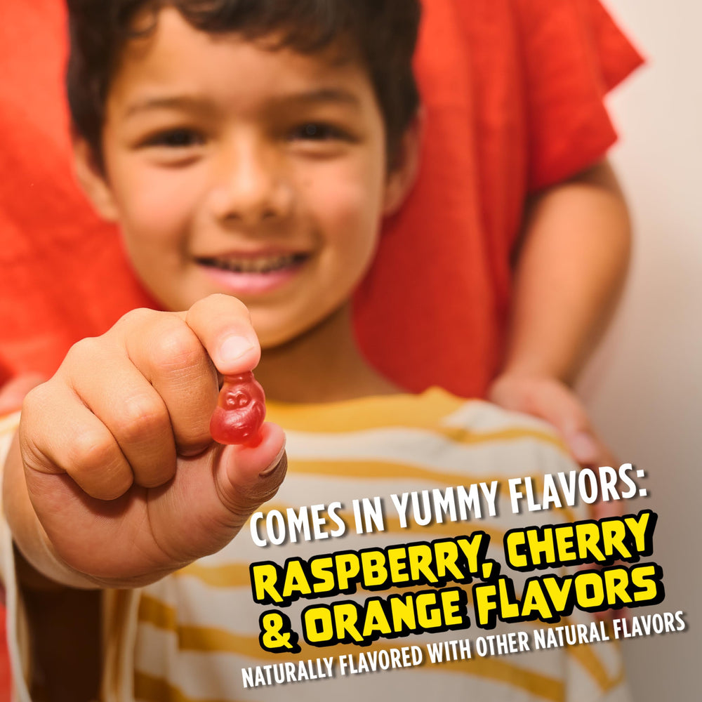 Flintstones Complete Gummies kid chewing a gummy highlights ease of use.