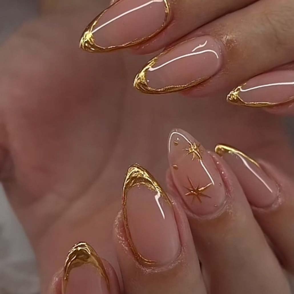 Foccna almond press-on nails with gold line design for a quick at-home manicure.
