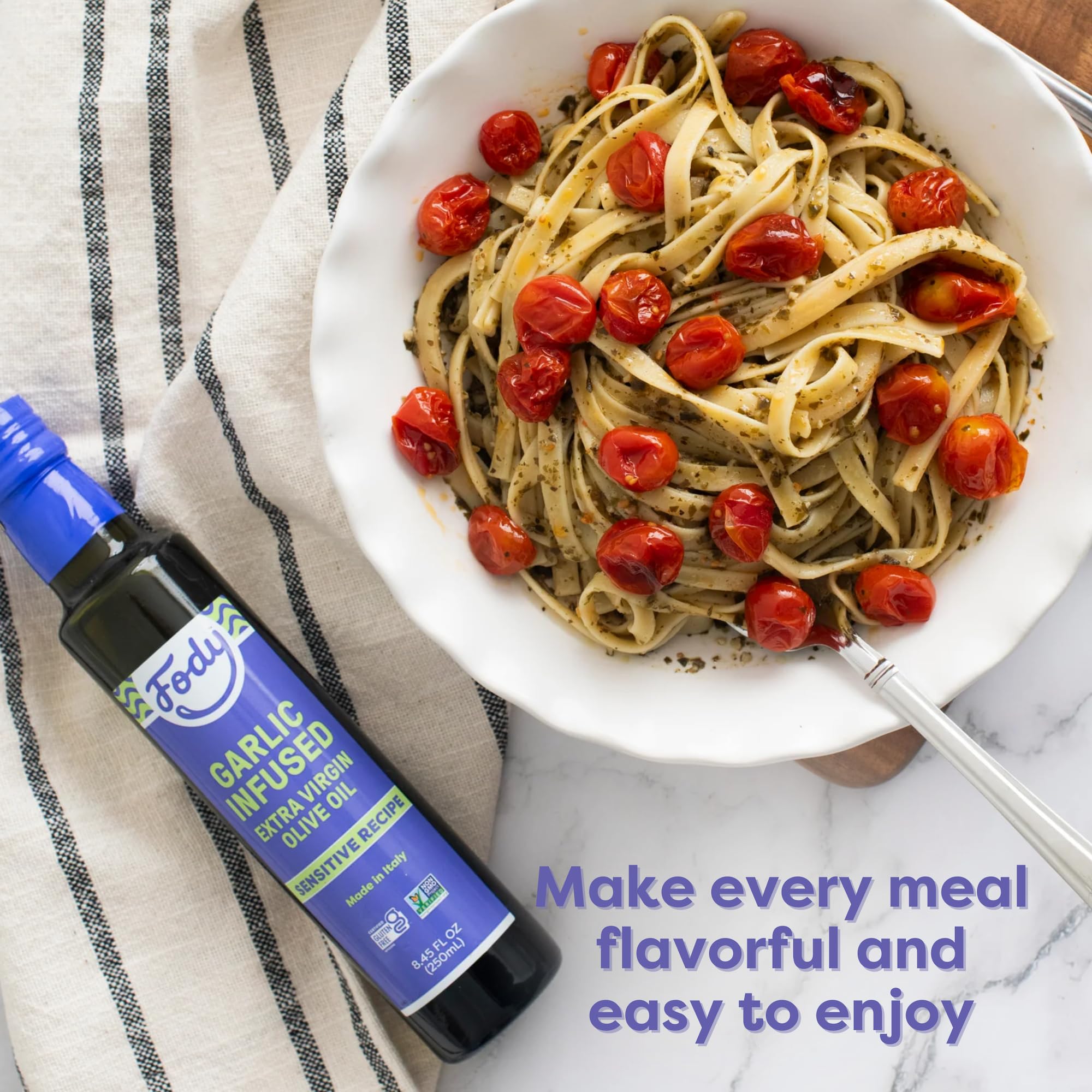 Fody ingredients on the counter with garlic oil as flavor booster.