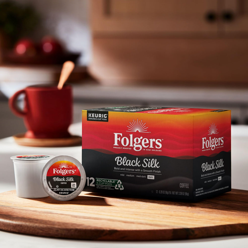 Folgers Black Silk steaming cup highlighting bold flavor and smooth finish.