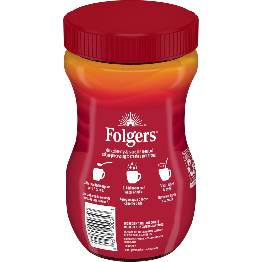 Measuring spoon with six ounces of water for easy Folgers prep.