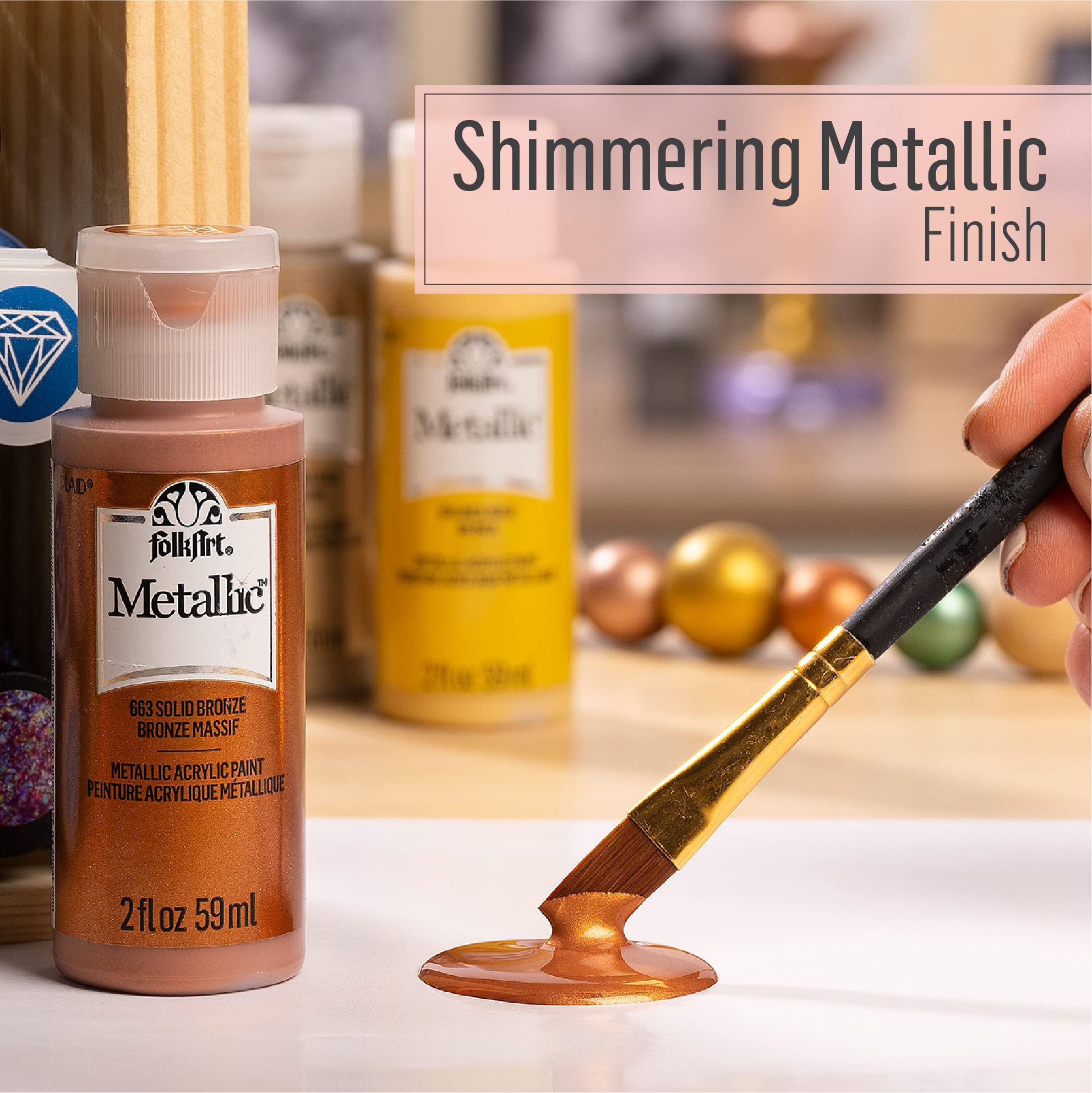 Creamy FolkArt acrylic paint strokes on canvas for smooth blending.