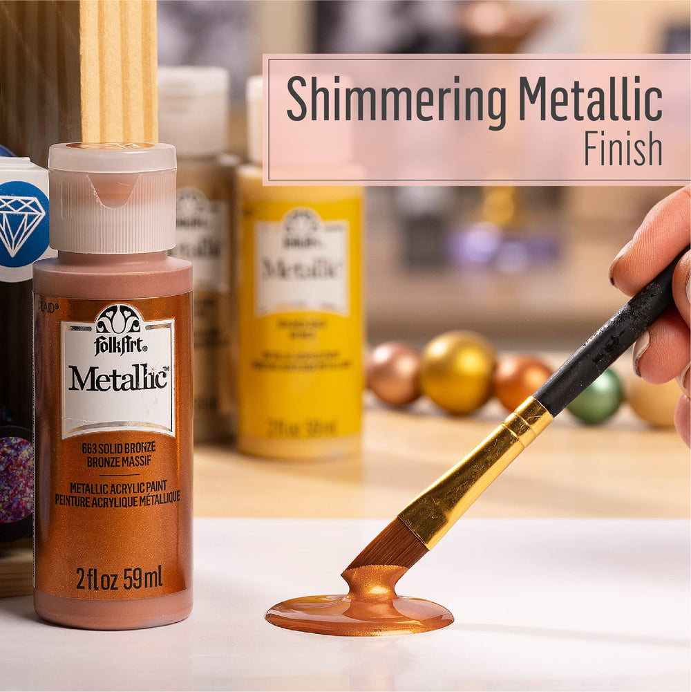 Creamy FolkArt acrylic paint strokes on canvas for smooth blending.