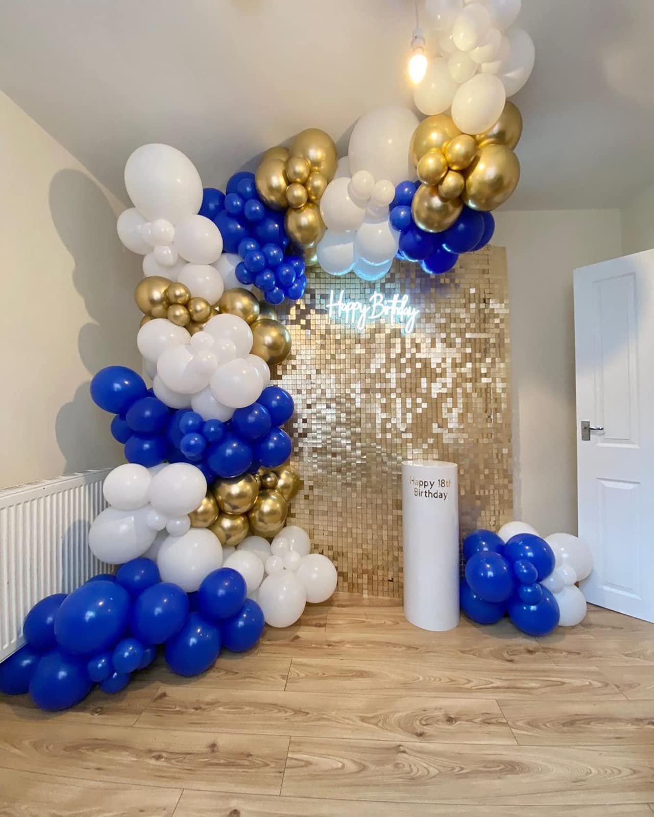 FOTIOMRG baby shower decor idea with royal blue balloons and elegant contrasts
