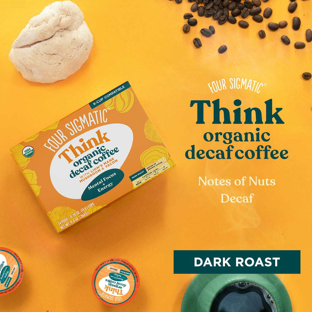 Four Sigmatic vegan keto pods beside a steaming mug for mindful energy