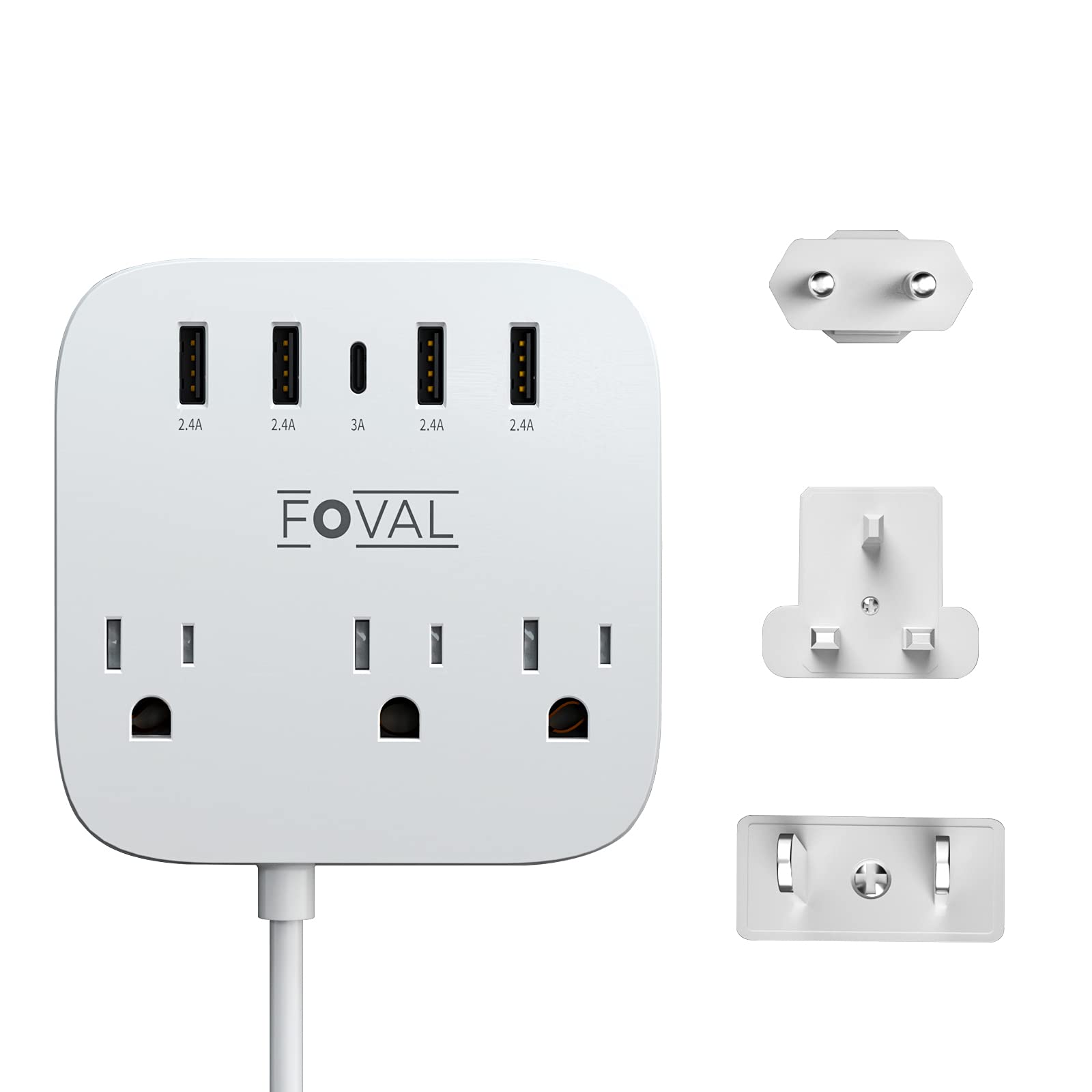FOVAL travel adapter on a desk powering multiple devices at once.