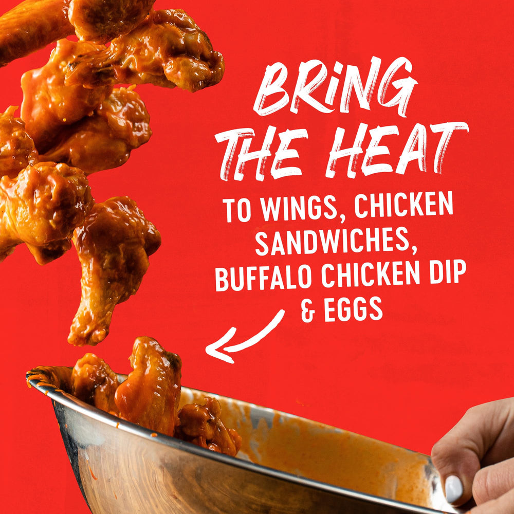 Tailgate table with Frank's RedHot for crowd-pleasing heat