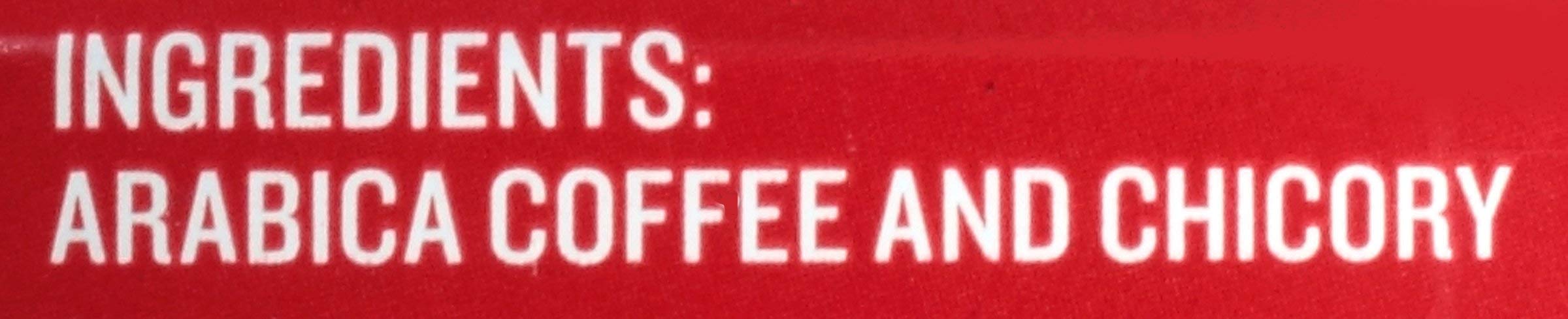 French Market Coffee & Chicory Dark Roast cup with milk reveals smooth, balanced taste.