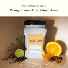 Fresh Wave Orange gel refill jar being topped off to refresh any room.