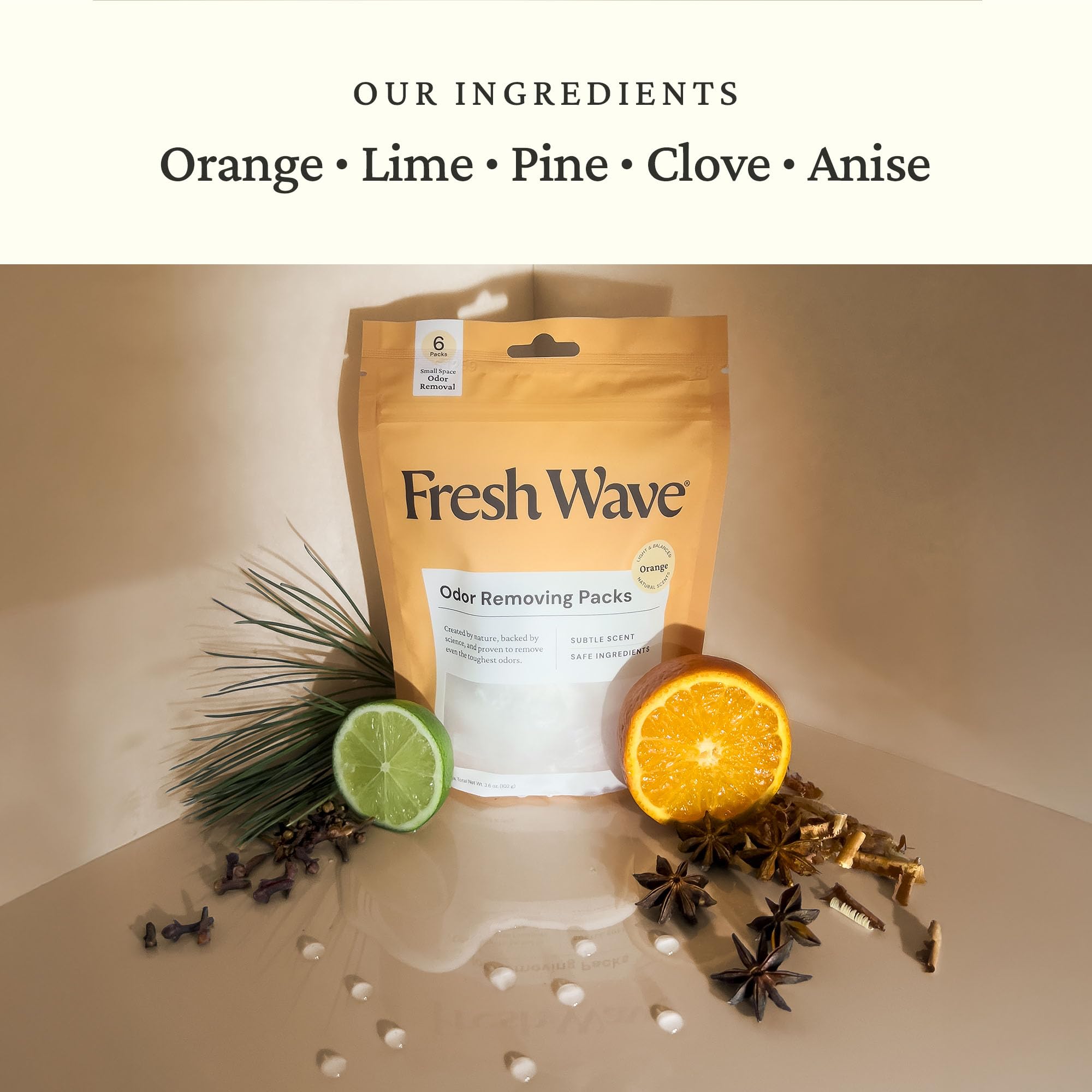 Fresh Wave orange pack sachet close-up demonstrates odor-eliminating action.