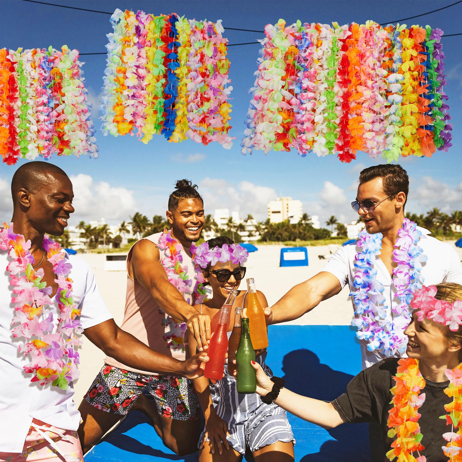 Colorful Freyalife leis laid out for beach party color palette.