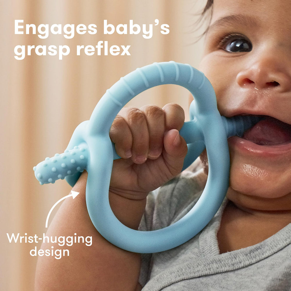Frida Baby teether offers multiple textures for front and back teeth relief.