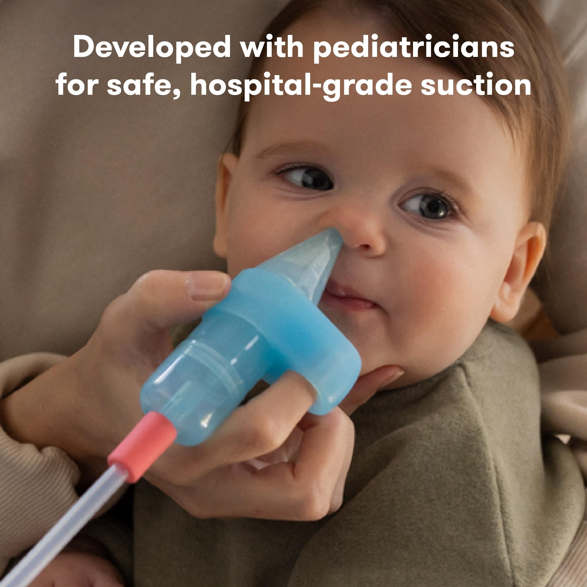 Frida Baby NoseFrida Pro finger loop enables one-handed operation for calm soothing