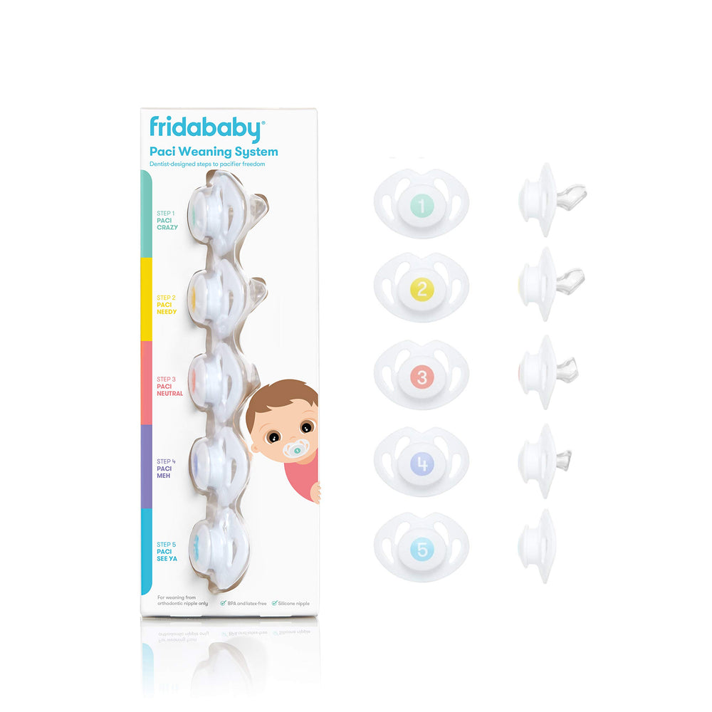 Frida Baby silicone paci weaning system pack shot highlights the complete kit for gentle transition.