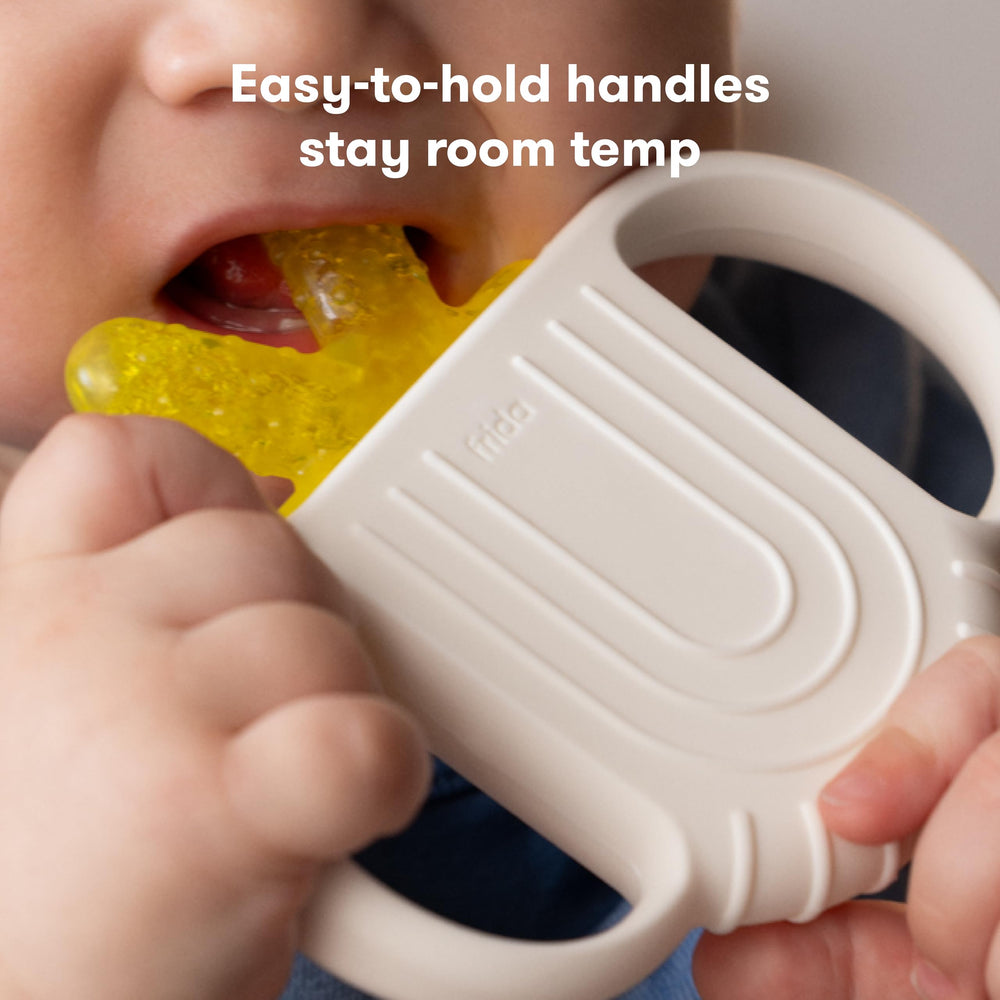 Frida Baby 4-sided teether textures provide massaging sensations across gums.
