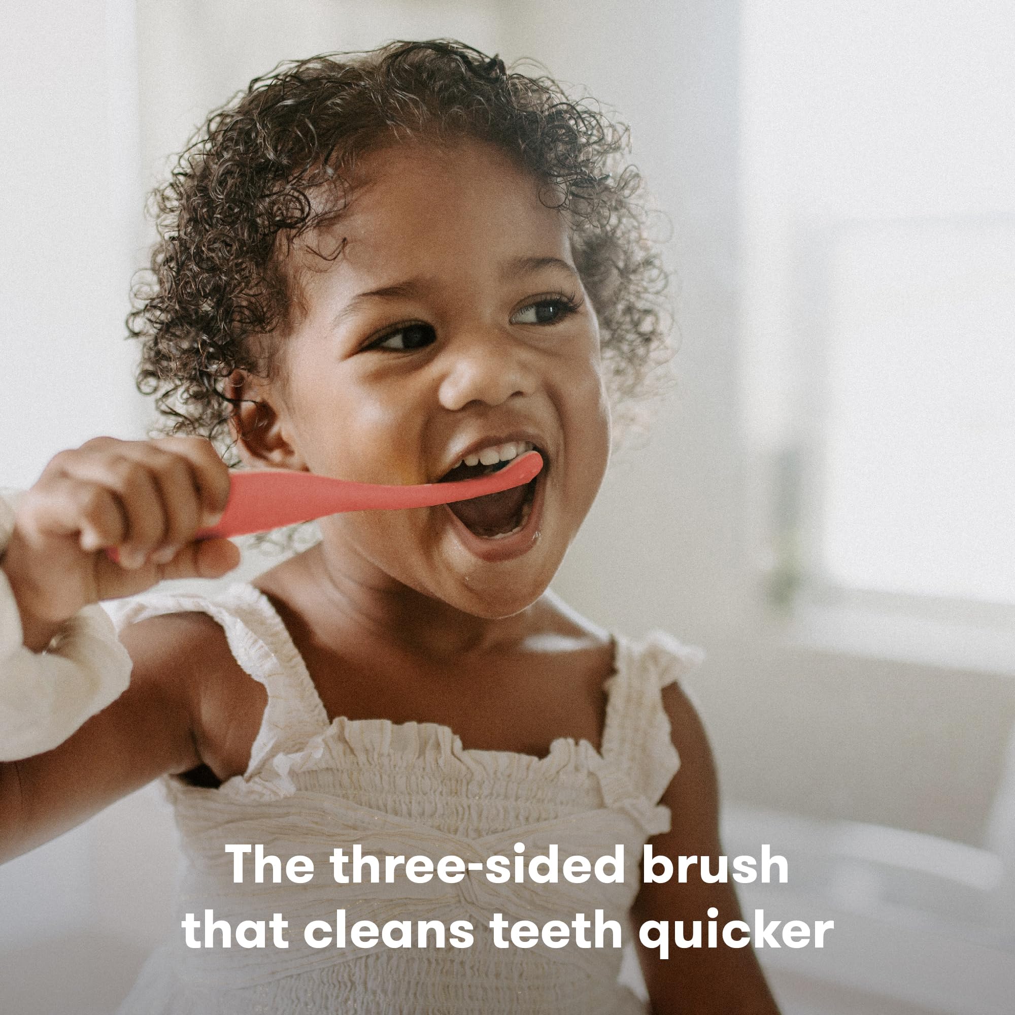Close-up of Frida Baby Toothhugger bristles showing soft, gentle brushing texture