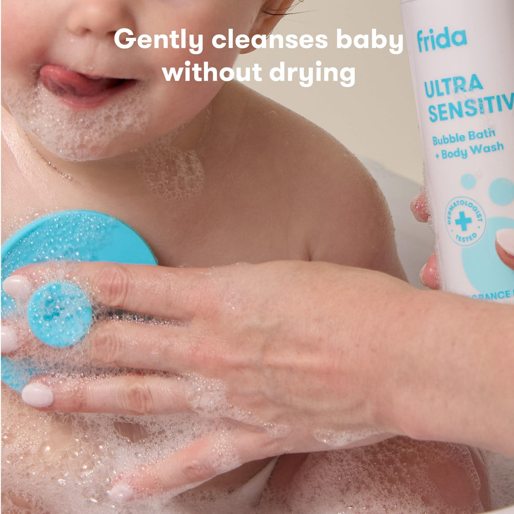 Frida Baby Twist-to-lock cap close-up demonstrates spill-free design.