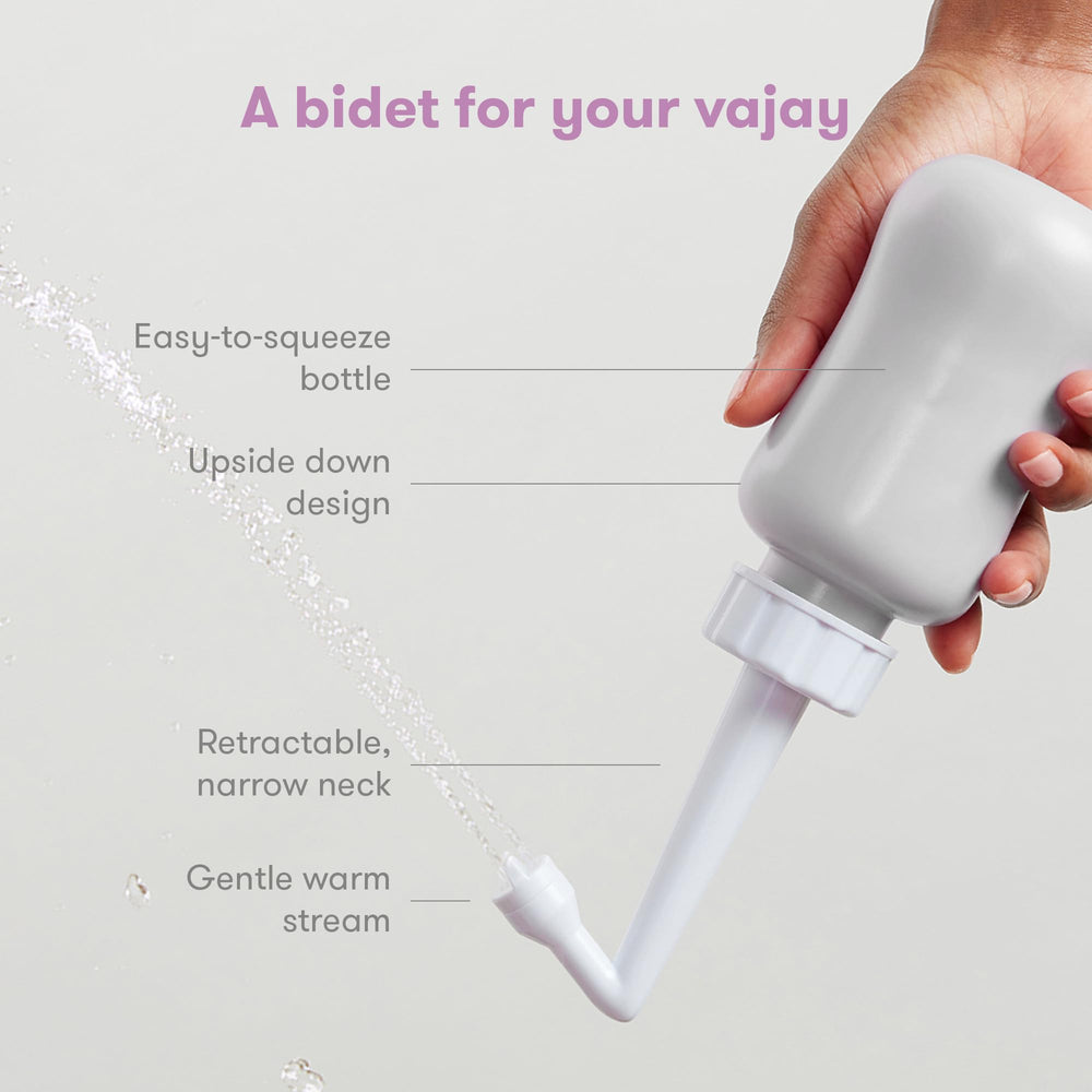 Frida Mom peri bottle cap and nozzle for precise, comfortable spray.