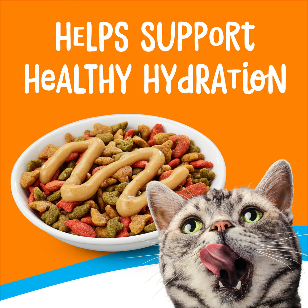 Friskies Lil’ Lickables pack, cats lick and purr with satisfaction after each squeeze.